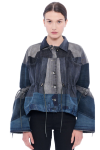 Brunette female model styled in denim shirt