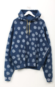 Dark blue hoodie with light blue polkadots and a yellow drawstring 